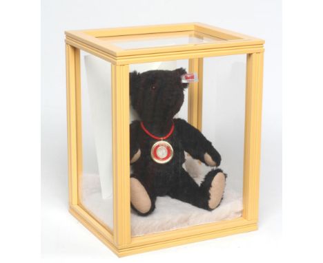 A Steiff RMS Titanic bear, no. 204, with certificate, ear button and tag, 3d bit dated 1912 around neck and perspex caseGood 