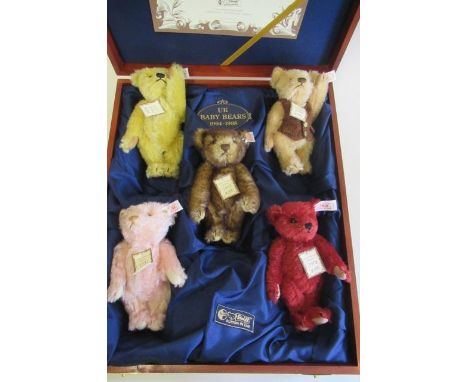 A boxed Steiff set, "Baby Bear Set 1994-1998", No. 00358, containing five bears of varying colours all with ear buttons and t