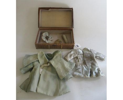 Doll's trunk, with inner level and exterior bamboo strapping, with an antique doll's shawl, oriental jacket, brush bag, money