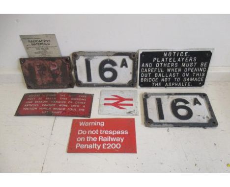 A cast and enamel railway notices for Trespass and Works Information, some items damaged and restoration of paintwork, F