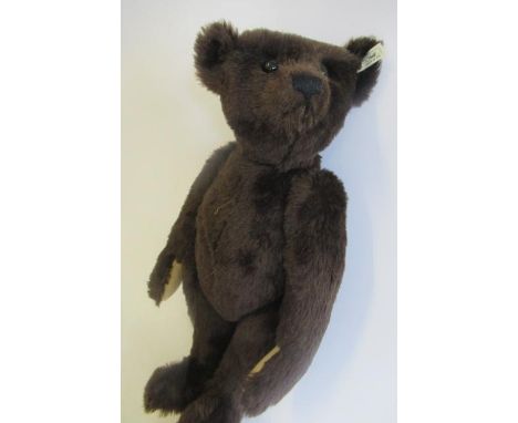 A boxed Steiff British Collector's 1907 replica teddy bear, No.01236, with brown plush, growl, ear button, ear tag and certif