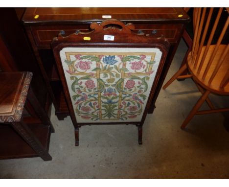 A mahogany and needlework firescreen 