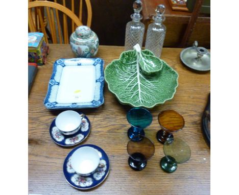 A Chinese ginger jar and cover; a green glazed leaf dish; four coloured glasses; two teacups and saucers etc.