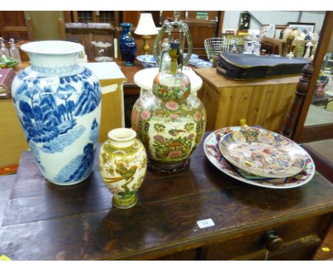 A quantity of oriental ceramics to include a Canton style table lamp; a blue and white vase etc. 