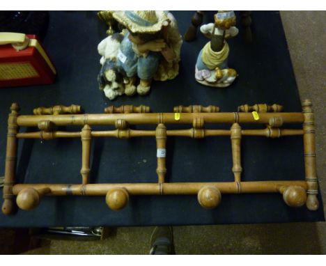 A set of French bamboo style coat hooks 