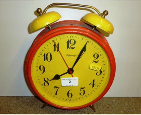 A West German tin plate alarm clock