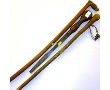 A carved horse's head walking stick; one other and a large screwdriver