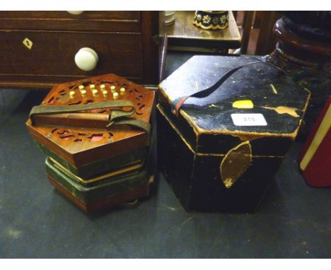 A mahogany ten button concertina in carrying case 