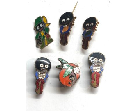 Selection of 6 vintage enamel Robertsons jam badge