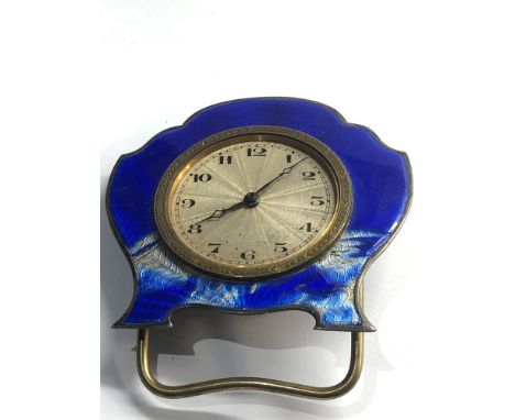 Vintage small silver and enamel bedside clock damage to enamel as shown winds and ticks but no warranty given 