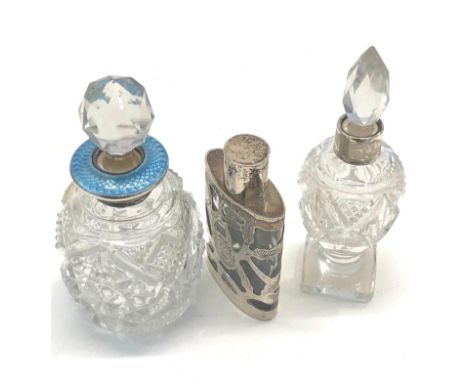 3 silver mounted scent bottles one with blue enamel in good condition please see images for details 