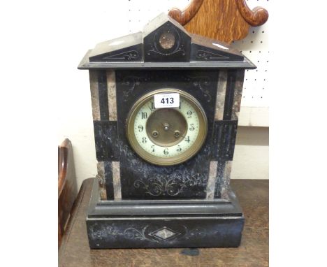 A late Victorian black slate and marble cased mantel clock of architectural design with S. Marti eight day gong striking move