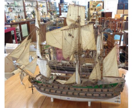 A wooden model of a Danish fourth rate 60 gun ship of the line in full rig - hull length 2' 8", rigging in need of restoratio