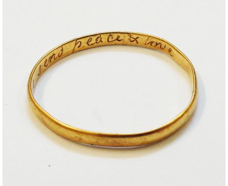 An antique yellow metal ring inscribed internally "God above send peace and love" - dug up by the vendor at Artillery Passage