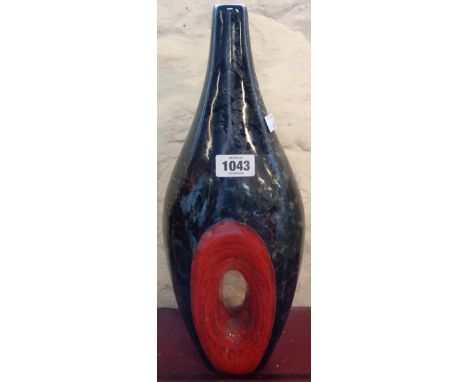 A large ceramic bottle vase