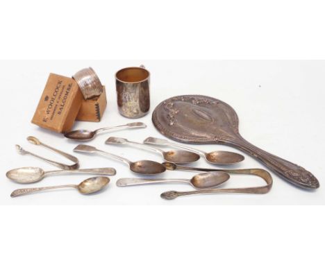 A small collection of Georgian and later silver teaspoons, two pairs of sugar tongs, napkin ring and small personalised chris