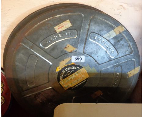 Two vintage Kodak horror film cans "Taste the Blood of Dracula" and "I Search of Dracula"