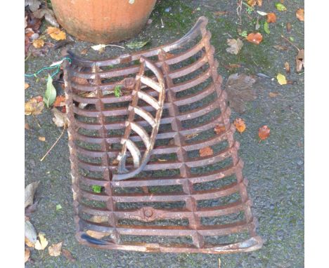 A cast iron fire grate