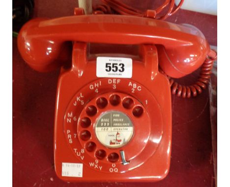 A vintage rotary dial telephone