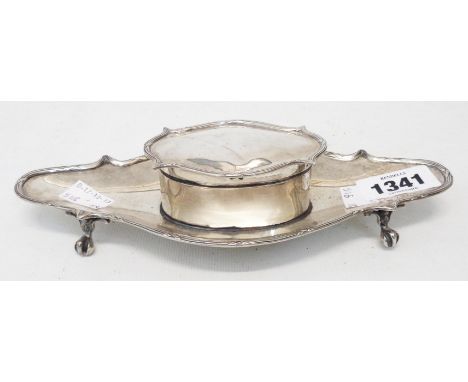 A silver dressing table flip-top ring box with shaped lid, set on a similarly shaped 8 1/2" tray base with stylised claw and 