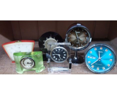 Two vintage rhythm mechanical alarm clocks - sold with four other small timepieces - various condition