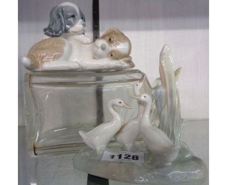 Two Nao figures of ducks and dogs