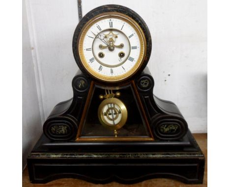 A late Victorian black slate and marble drum and scroll pedestal cased  mantel clock with visible escapement to dial centre a