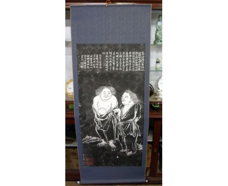 A 20th Century Chinese monochrome scroll print depicting two figures with character text to top and large red seal stamp to b