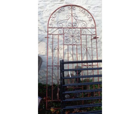 A 35" wrought iron garden gate