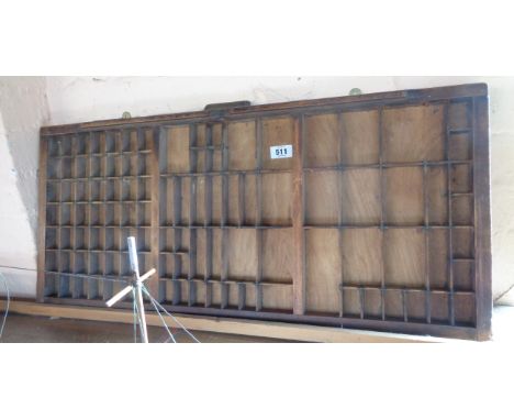 A vintage typesetting tray