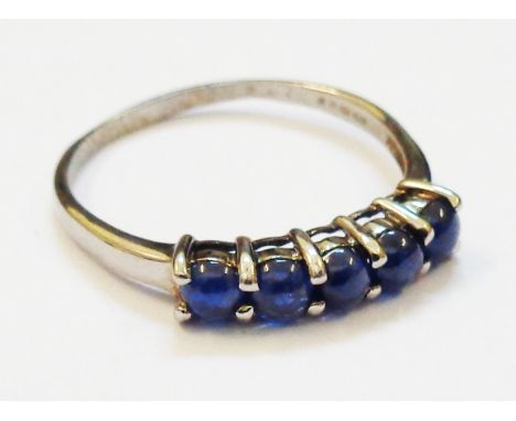 A marked 9k five stone sapphire bead ring 