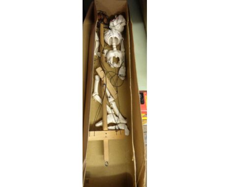 A vintage Pelham Puppet Skeleton in brown box with two-tone label - box defaced