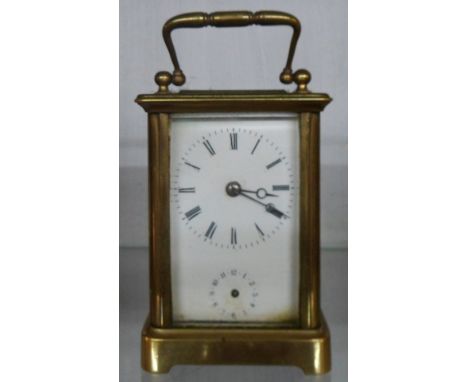 An early 20th Century brass cased carriage clock with eight day alarm movement - alarm dial hand missing