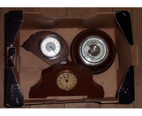 Two small timepieces - sold with an aneroid wall barometer with visible works