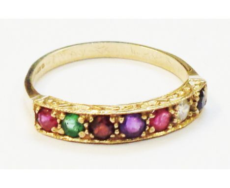 A hallmarked 375 gold ring, set with a row of seven differing coloured gemstones spelling the word "REGARDS"