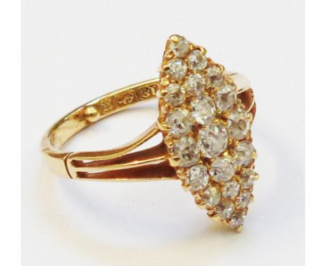 A hallmarked 18ct. gold diamond encrusted marquise panel ring - with copy of valuation certificate