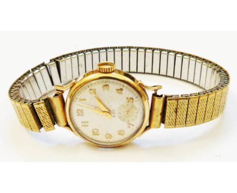 A vintage ROC lady's 9ct. gold cased wristwatch with seventeen jewel movement and plated strap