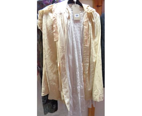 A quantity of vintage linen, lace edged clothing, baby gowns, evening cape, etc.