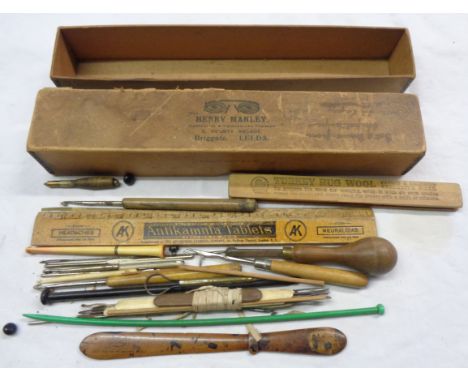 A box containing a quantity of needlework tools and other items including Mauchline ware letter opener 'Made of wood which gr