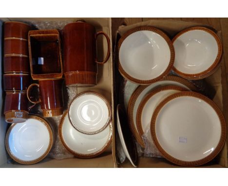 A quantity of Poole pottery dinner and teaware