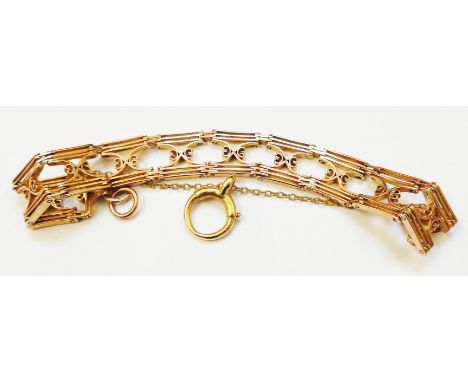 An early 20th Century marked 9c rose metal fancy gate-link bracelet with safety chain