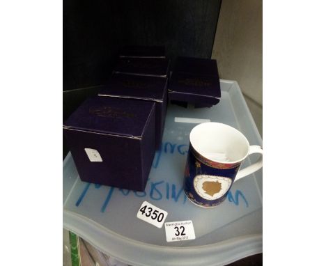 Five boxed Royal Worcester commemorative Queen Elizabeth II mugs