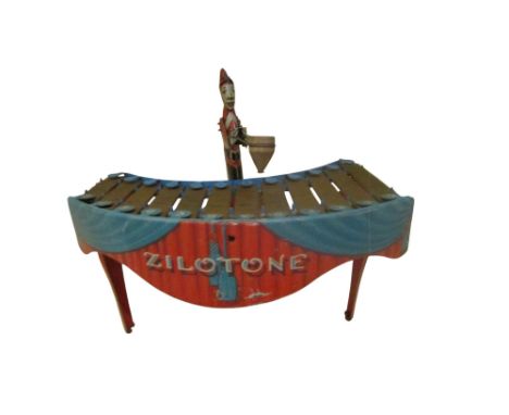 A vintage clockwork Wolverine Zilotone toy xylophone c.1930, together with five playing discs, including Farmer in the Dell, 