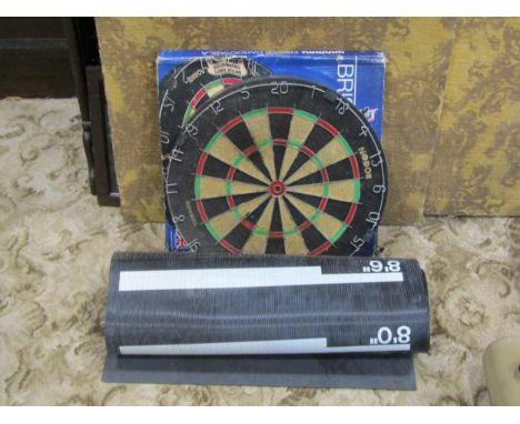Two pub darts boards (one boxed), together with associated mats