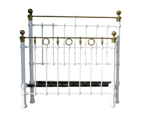 A Victorian brass and iron double bedstead, to accept a 4ft 6 mattress (complete with side rails)