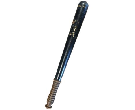 A Victorian Policeman’s Truncheon, wear to the painted cypher, 47 cm.