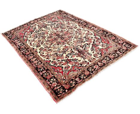 Northwest Persian Lillihan rug, with an all over floral pattern 218cm x 150cm
