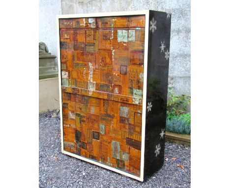 An unusual decorative continental lacquered secretaire abattant, the front lacquered with abstract block decoration, angle fa