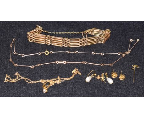A gate bracelet; pendant; earrings