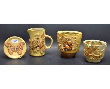 Studio pottery - a Bernard Rooke Squirrel and Acorn decorated planter;  another Owls;  a similar jug;  a butterfly dish , thr